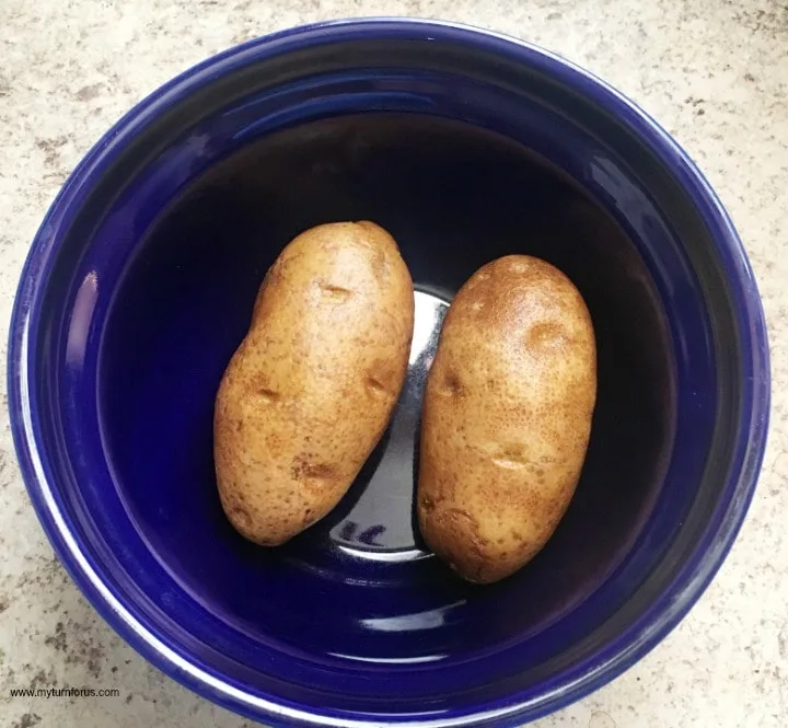 blue bowl with potatoes