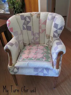 Chair covered in old patchwork quilt