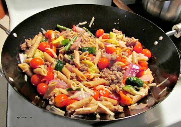 wok full of sweet Italian sausage pasta recipe which is a quick dinner idea