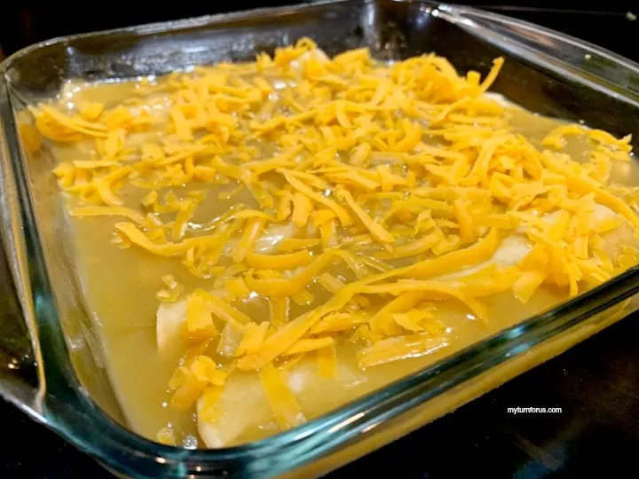 Pan of Chicken Enchiladas with cheese