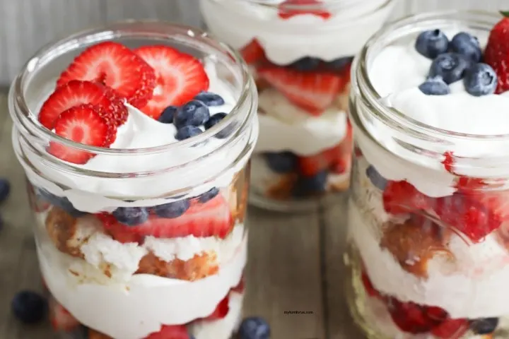 Mason Jar dessert with strawberries and blueberries