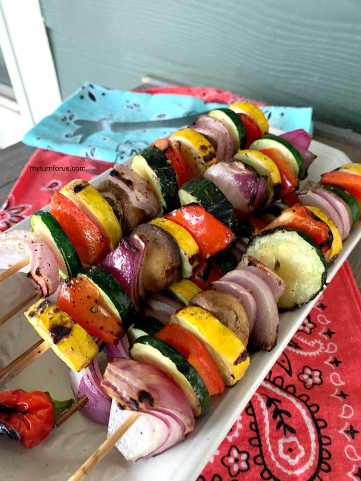 Grilled Vegetable Kabobs, onions, bell pepper, mushrooms, zucchini and squash on a skewer