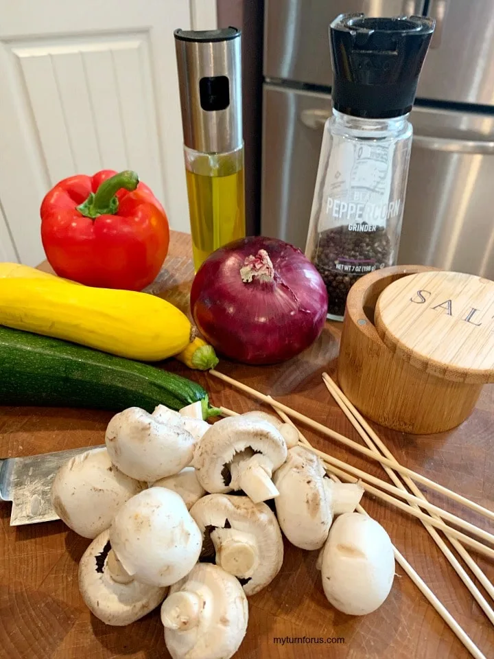 veggie for skewers, bell pepper, purple onion, mushrooms, zucchini, yellow squash and skewers