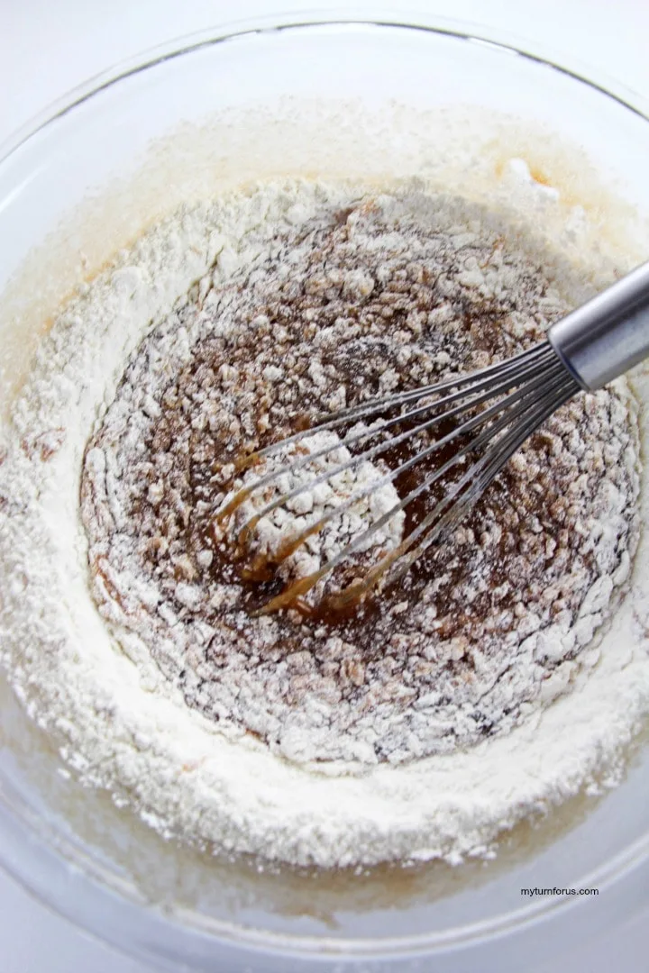 Mixing the flour in the rocky road brownies