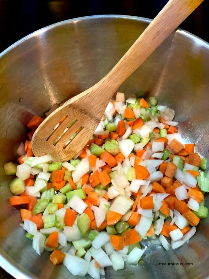 cooking onions, carrots and celery