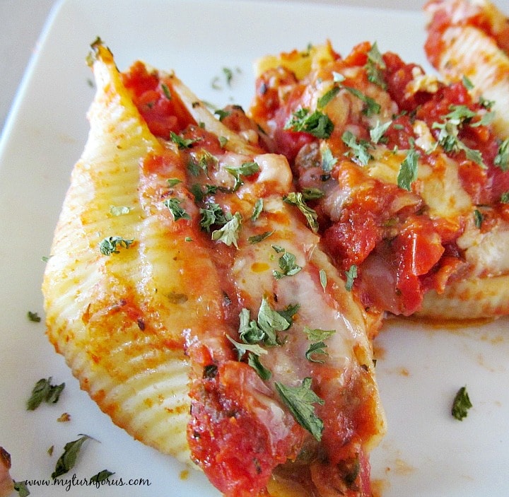 giant cheese stuffed shells with red pasta sauce