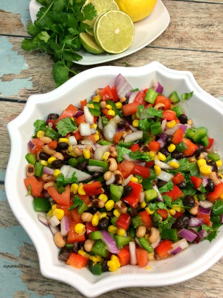 Cowboy Salad Recipe, Cowboy caviar. bowl of beans, corn, peppers and onions and seasonings 
