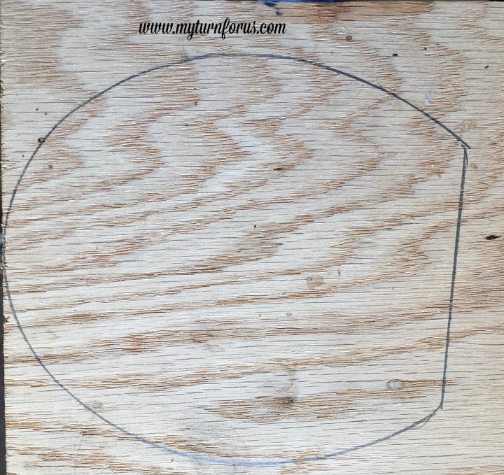 Horseshoe Fairy Door for the most magical fairy garden! https://www.myturnforus.com/2016/03/horseshoe-fairy-door.html Horseshoe-shaped door outline traced onto a piece of half-inch plywood before cutting.