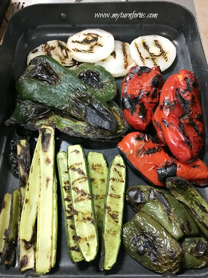 Making Spicy Bloody Mary Infusion with grilled peppers and onions