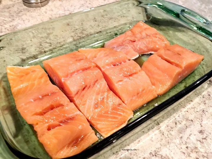 Salmon fillets in dish