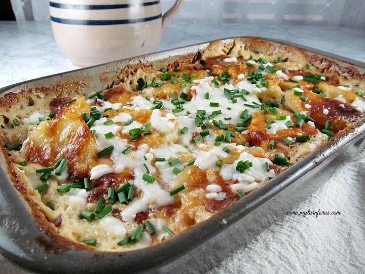 Layer potatoes and cheese for