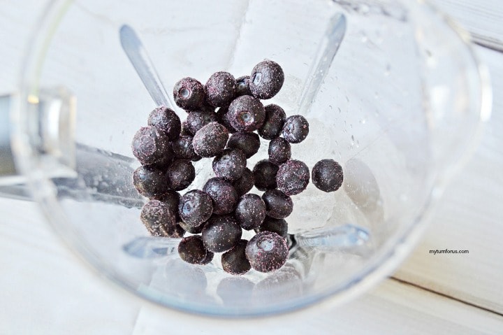 frozen blueberries in glass