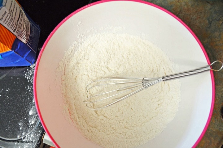 Mixing flour in bowl