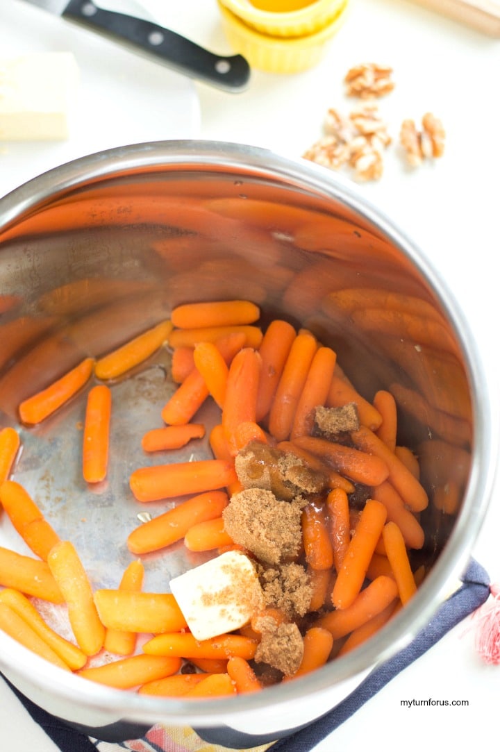 Honey glazed baby carrots cooking in an instant pot