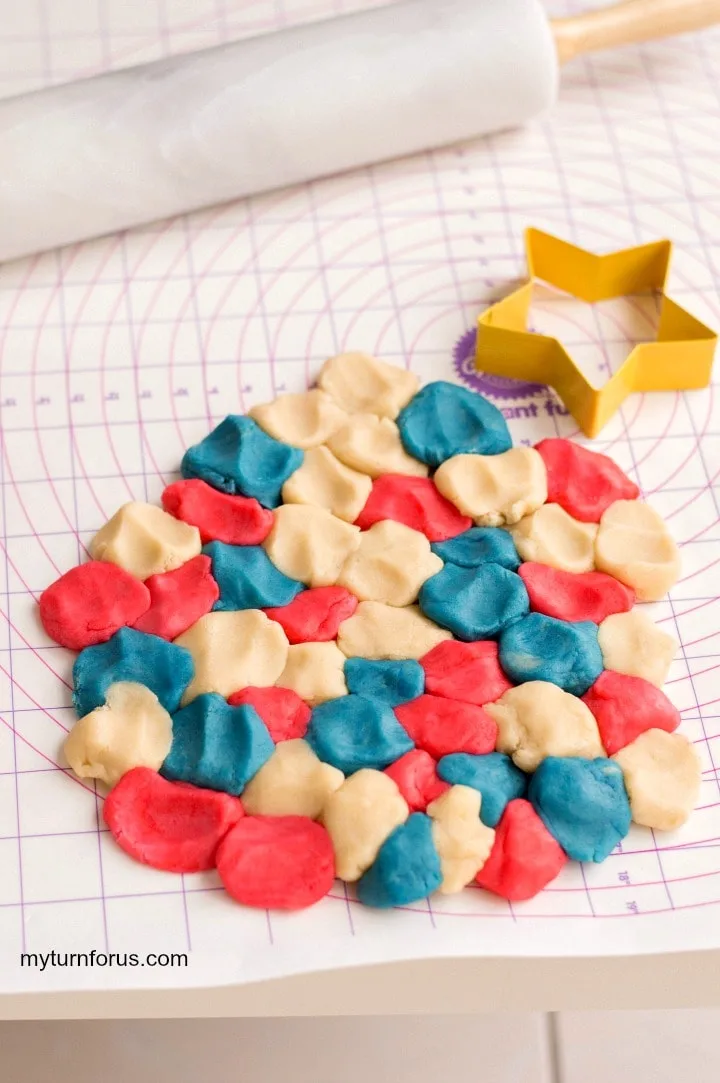 piecing colored dough together