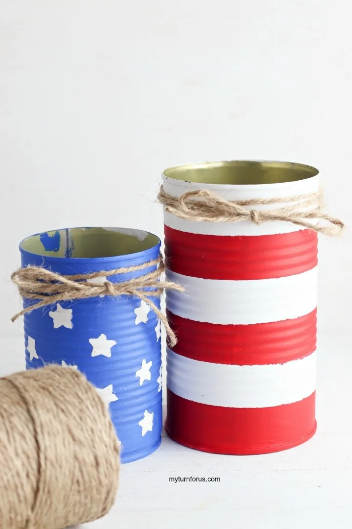 Painted cans, patriotic centerpiece, Tie a bow around the top of each painted can with twine