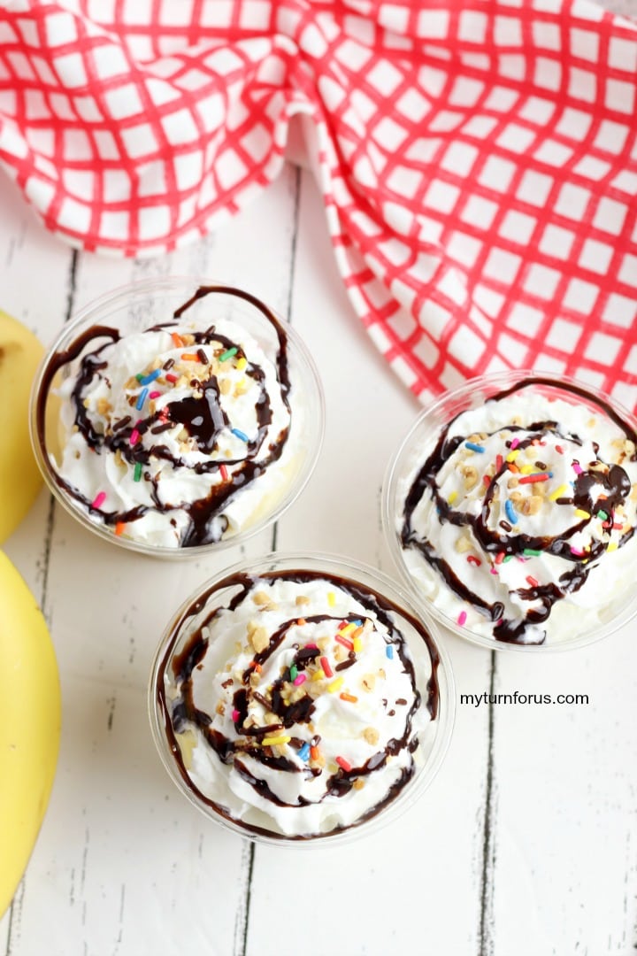 Banana parfaits topped with chocolate, nuts, and sprinkles