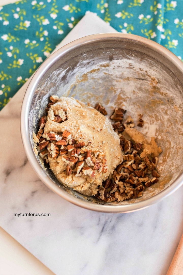 adding Pecans to the Cookies batter