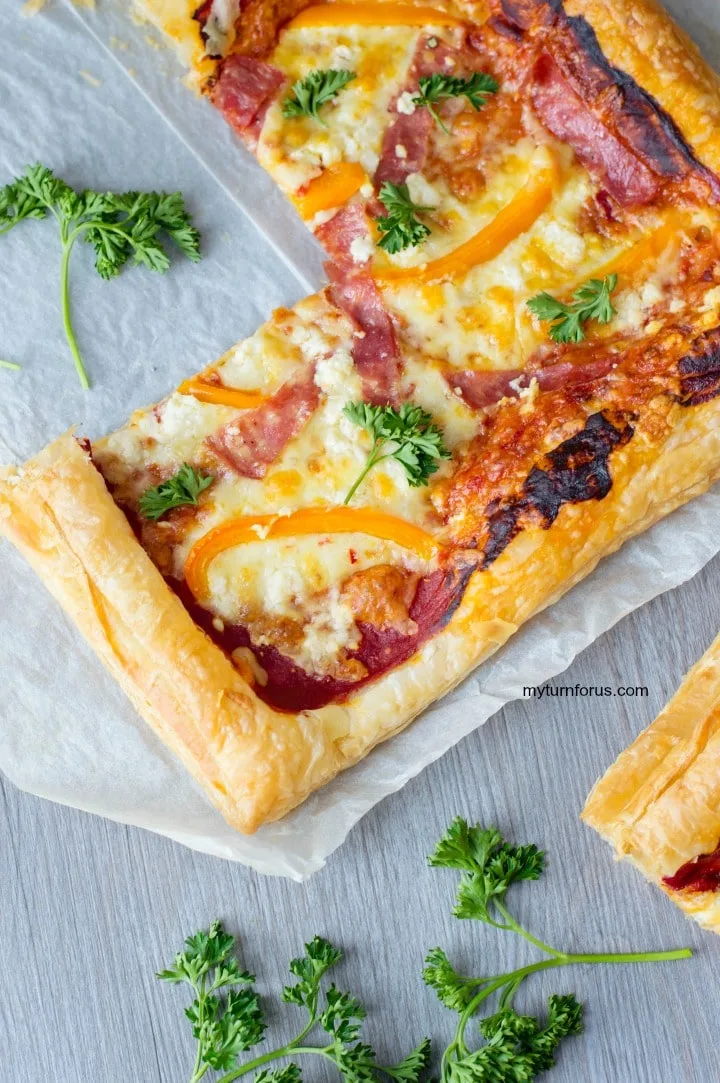 puff pizza, with salami, bell pepper and feta