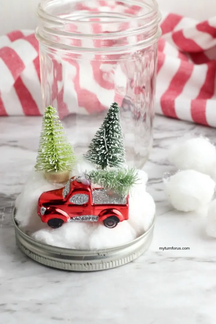 ornament and trees on cotton balls 