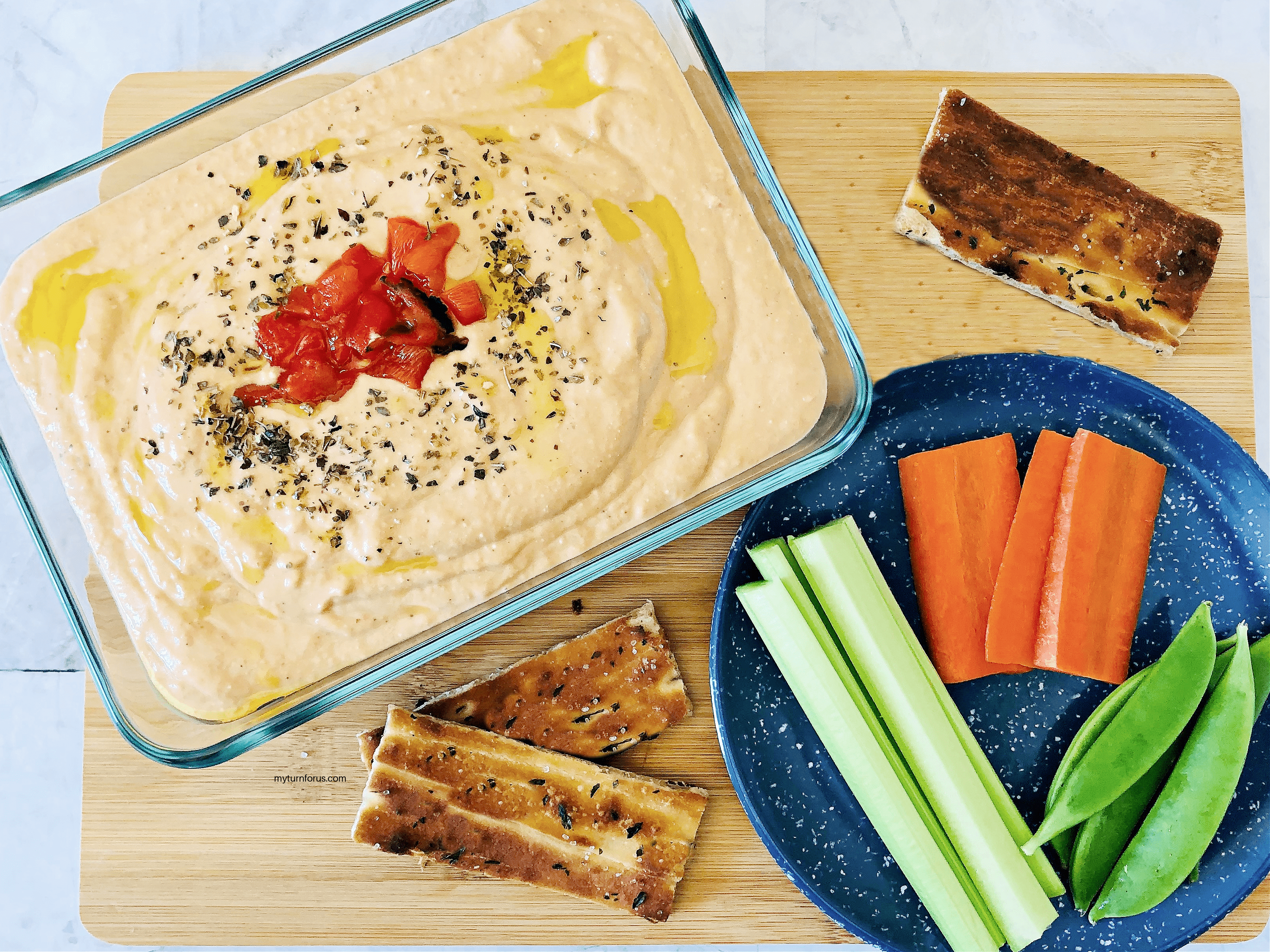 roasted red pepper & feta hummus and what you can eat with hummus like carrots, celery, pita and peas