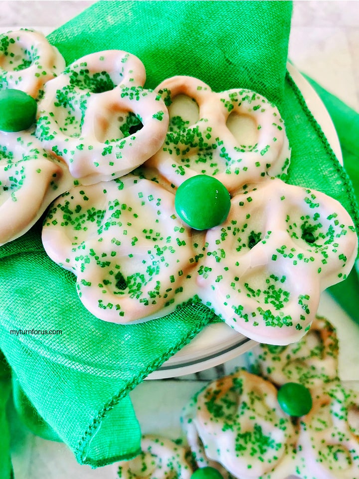 White chocolate coated pretzels with green sprinkles, St Patrick's day pretzels