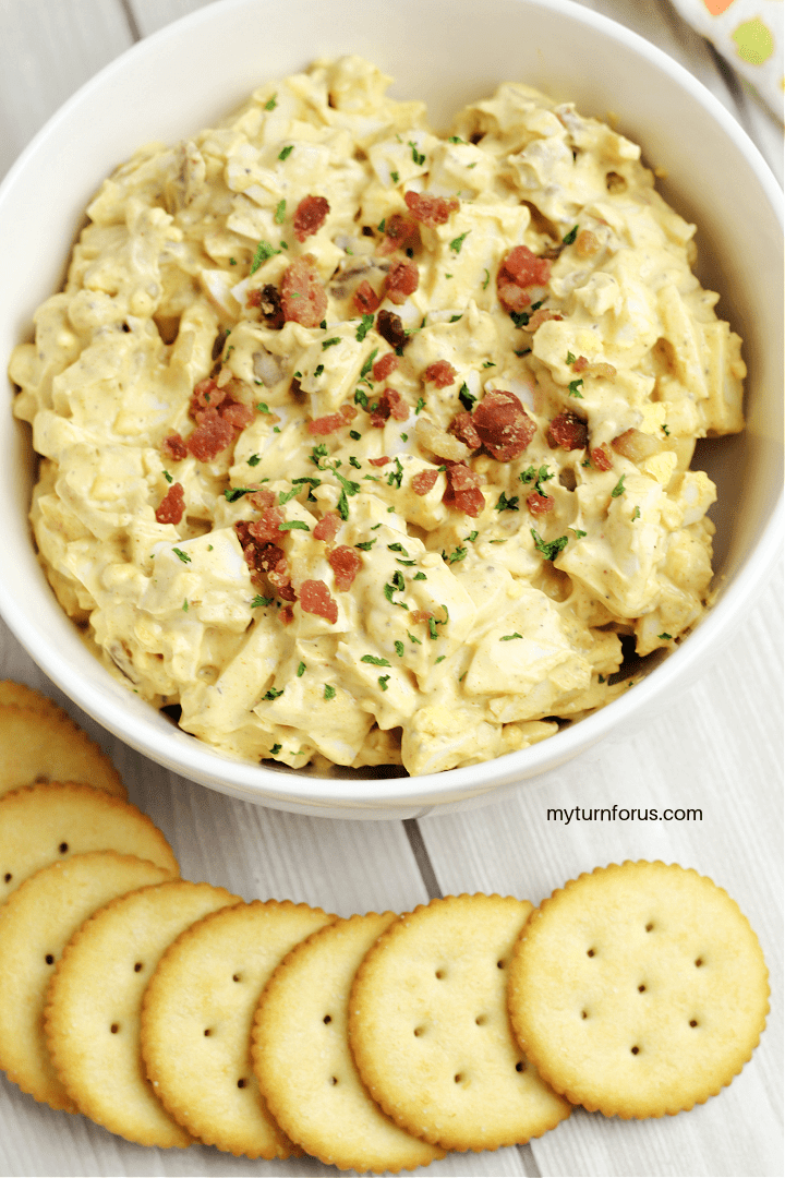 Southern Egg Salad topped with bacon and served with crackers
