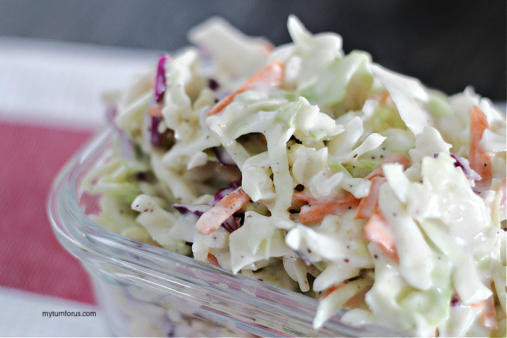 copycat cracker barrel coleslaw in a clear dish with a miracle whip coleslaw dressing