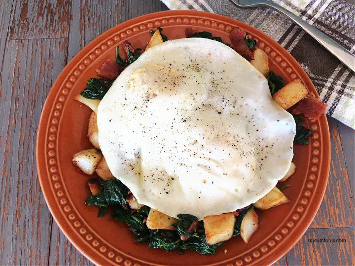 fried eggs with spinach hash