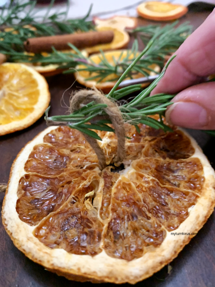 orange slice with rosemary
