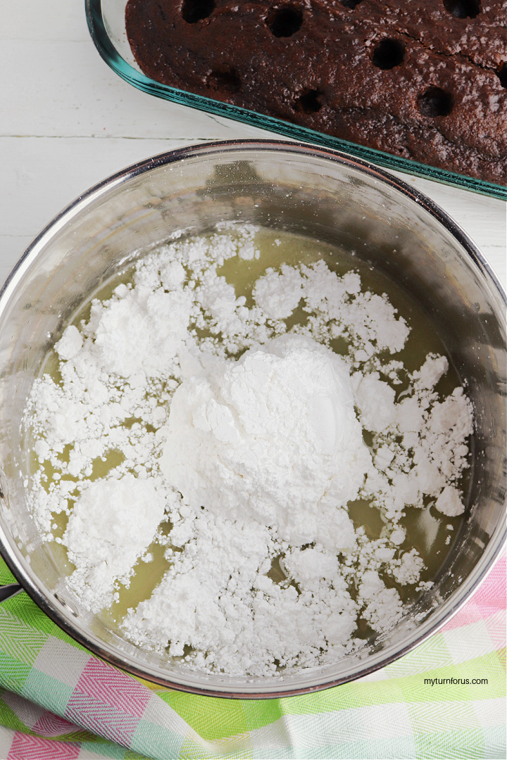 adding powdered sugar to creme filling