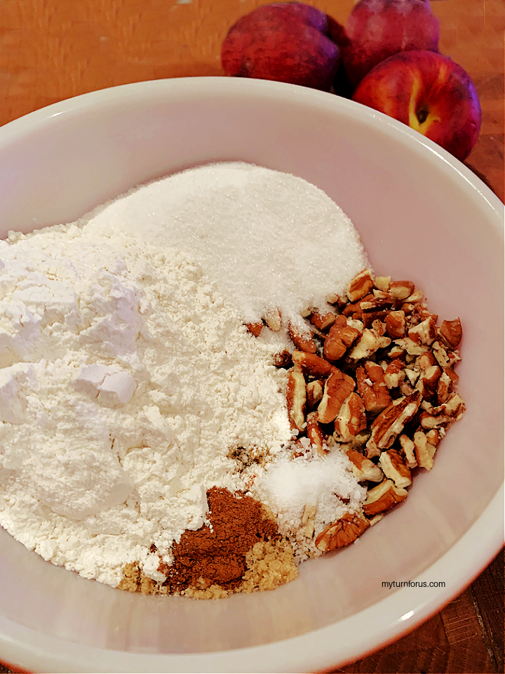 adding flour and sugar to the pecans and brown sugar