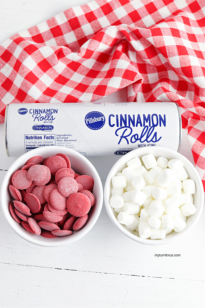 marshmallows, candy melts and package of rolls