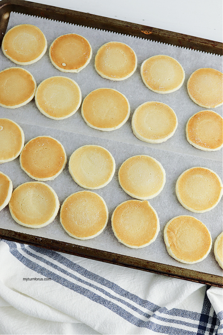mini pancakes on baking sheet