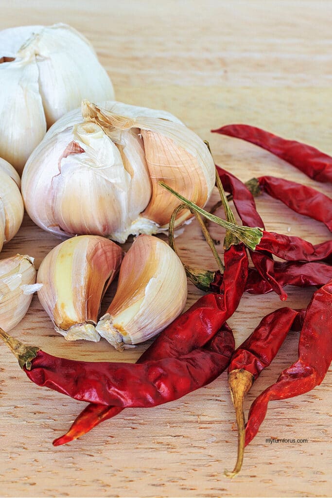garlic cloves and whole Thai chili
