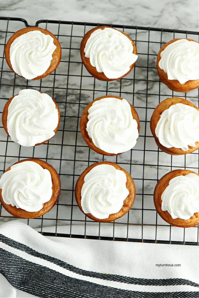 pumpkin spice cupcakes on rack