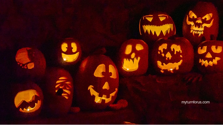 Jack o lanterns on porch for pumpkin puree