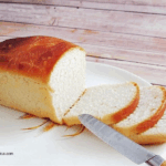 homemade white bread with a bread knife