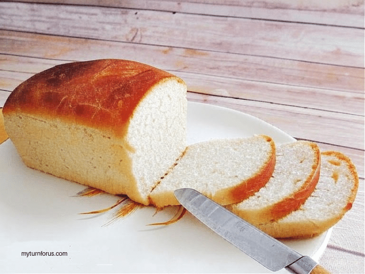 homemade white bread with a bread knife