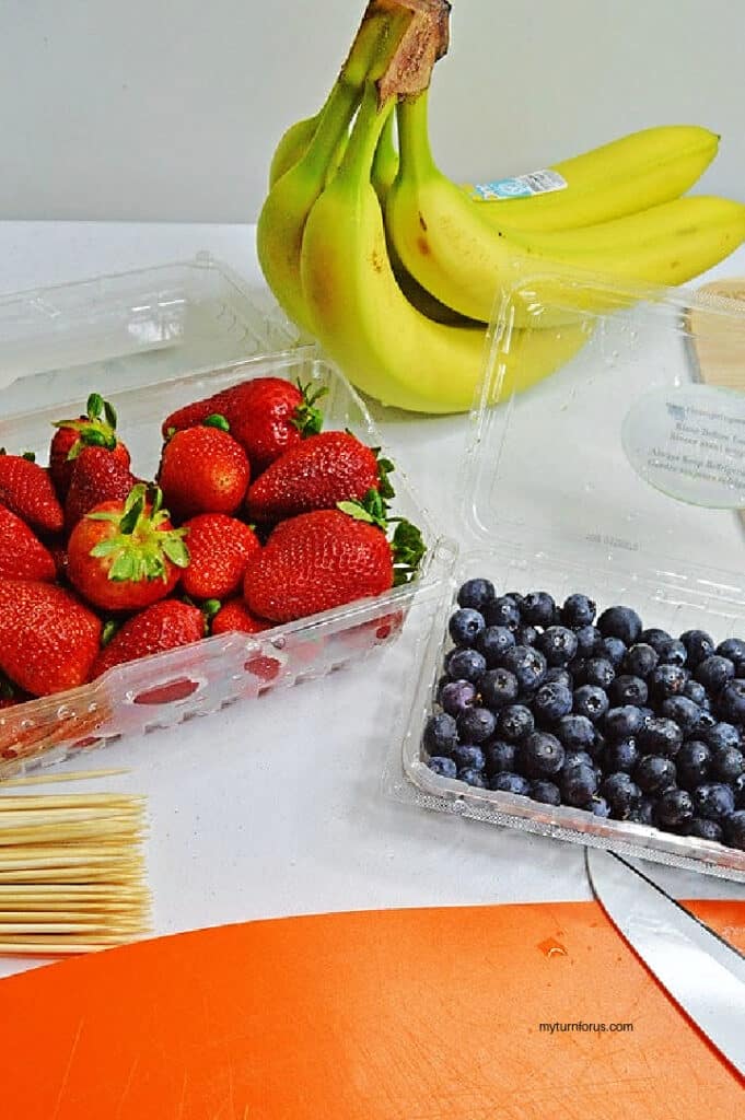 Ingredients for Fruit Skewers Bananas, Strawberries, and blueberries for fruit skewers